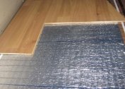 Installation of underfloor heating under the laminate floor