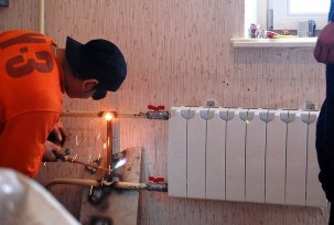 Caractéristiques du remplacement des piles, des radiateurs et des tuyaux de chauffage dans un immeuble d'habitation