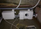 Features of installation of forced sewage in a private house