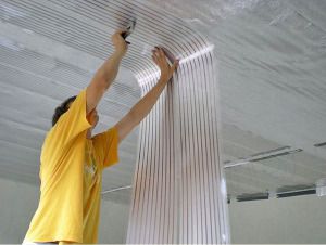 Film elements are fixed to the ceiling with a stapler