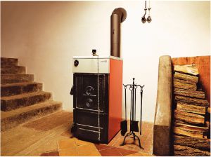Cazanul de piroliză servește ca generator de căldură într-un sistem de încălzire la domiciliu