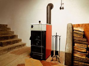 Heating a house with a solid fuel boiler